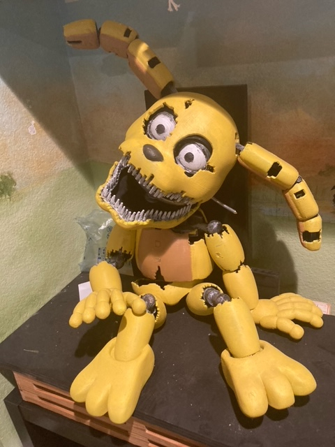 Metal, yellow replica of Plushtrap from the video game series Five Nights at Freddy's