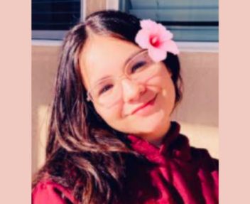 Briyannah, a female Independent Study online high school student, smiles at the camera