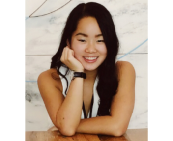 Female student posing and smiling for the camera