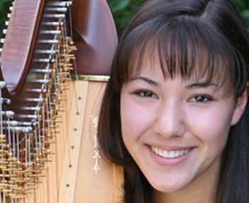 Image of Hannah Till, a student with a harp