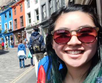 High school graduate smiles while studying abroad
